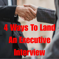 Close-up of two professionals shaking hands, representing strategies to land an executive interview.
